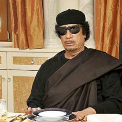 Muammar Gaddafi.