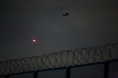 Two helicopters approach the La Picota prison on February 27. Mancuso was allegedly traveling in one of them.