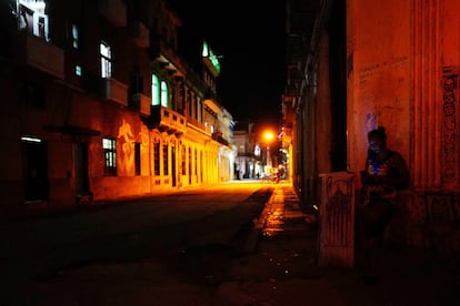 A woman on her cell phone in downtown Havana, Cuba, on March 17, 2024.