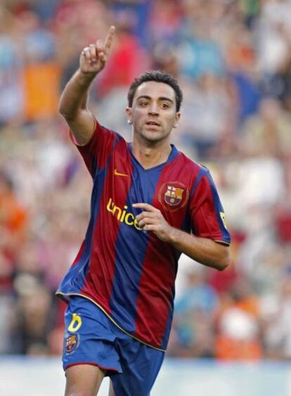 Xavi celebra un gol del Barça.