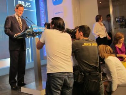 El presidente del PP, Mariano Rajoy, durante la rueda de prensa en Génova.