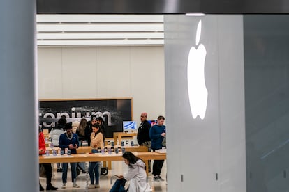 Customers in one of the Apple brand's stores in New York