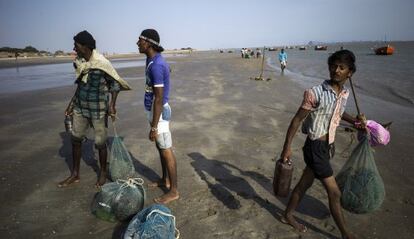 Pescadores de Tragadi Bandar.