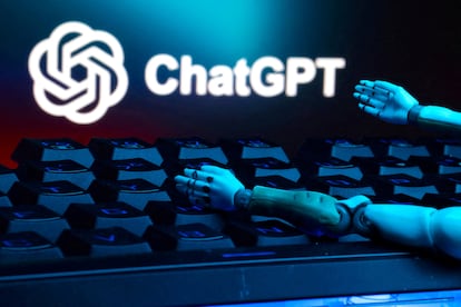 FILE PHOTO: Illustration shows ChatGPT logo, keyboard, and robot hands