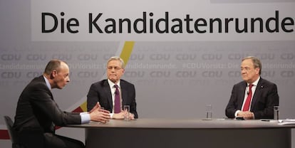 De izquierda a derecha, Friedrich Merz, Norbert Roettgen y Armin Laschet, candidatos a suceder a Angela Merkel al frente de la CDU.