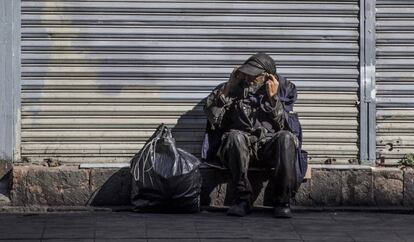 Um mendigo, no centro da Cidade do México.
