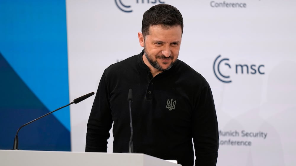 Ukraine's President Volodymyr Zelenskyy prepares to make his speech during the Munich Security Conference at the Bayerischer Hof Hotel in Munich, Germany, Saturday, Feb. 15, 2025. (AP Photo/Matthias Schrader)