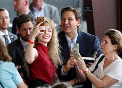 Florida Governor and likely 2024 Republican presidential candidate Ron DeSantis poses for a selfie after speaking as part of his Florida Blueprint tour in Pinellas Park, Florida, U.S. March 8, 2023.