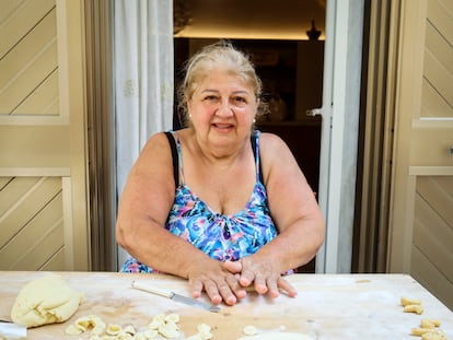 Nunzia Castro makes orecchiette in front of her house in Bari