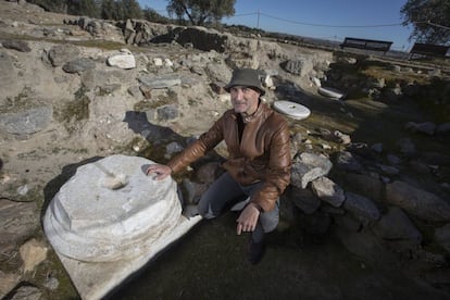 Archeologist Juan Manuel Rojas, with one of the tombstones at the Guarrazar basilica.