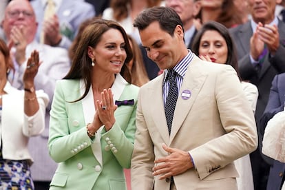 Kate, Princess of Wales, left, shares a word with tennis champion Roger Federer