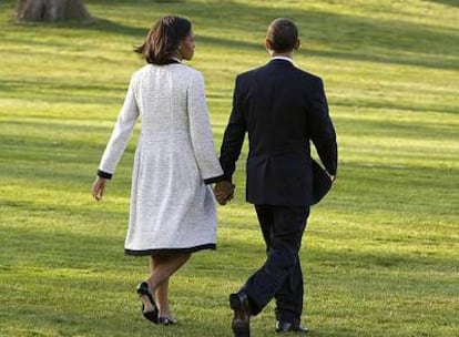 El presidente Barack Obama y su esposa, Michelle, en la Casa Blanca antes de partir a Londres.