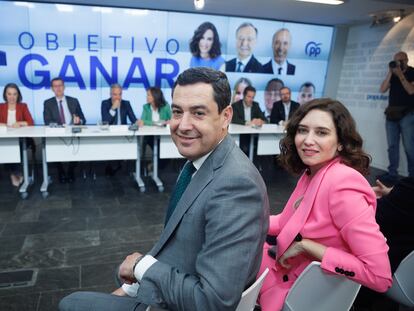 Juan Manuel Moreno e Isabel Díaz Ayuso, el lunes en la sede nacional del PP, en Madrid.