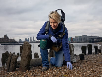 The 'mudlarker' Lara Maiklem searching the banks of the Thames near Greenwich, in a photograph provided by the publisher.