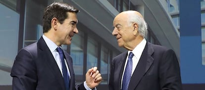Carlos Torres, con Francisco González.