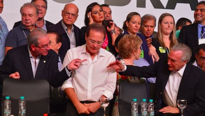 Eduardo Cunha, Renan Calheiros e Michel Temer em convenção do PMDB em Brasília, em março.