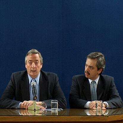 Néstor Kirchner (derecha), junto a Roberto Lavagna.