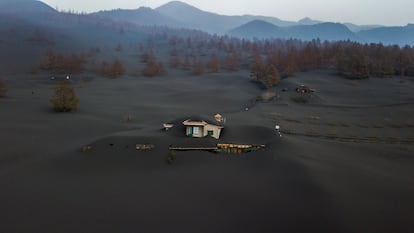 A house covered in ash, photographed by a drone on November 1.