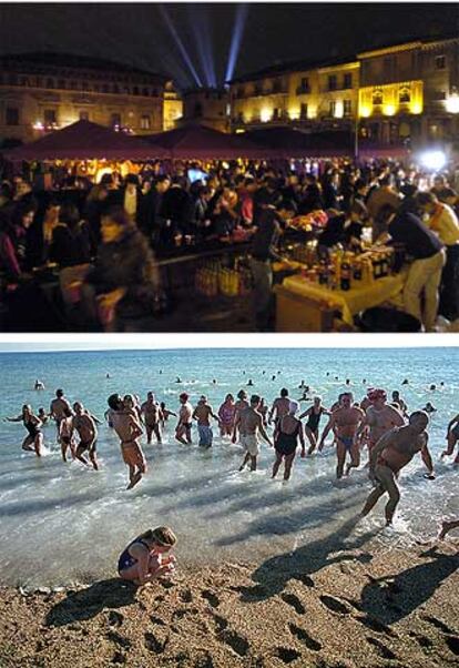 La Nochevieja se despidió con alegría. Ayer, más de 200 personas empezaron el año bañándose en la Barceloneta.