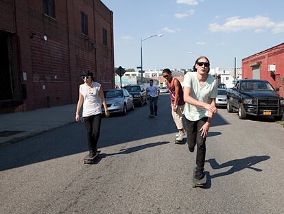 Skateboarders on urban street