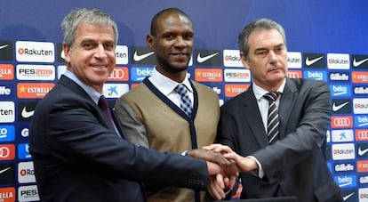 Éric Abidal (center) is introduced as Barça's new technical secretary.