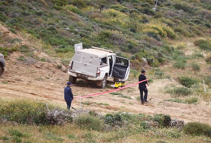 Experts work at the site where the bodies were found, on May 5 in the town of Santo Tomás, near Ensenada.