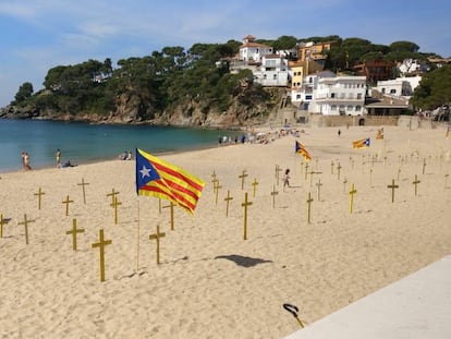 Crosses on a beach in Llafranc (Girona). 