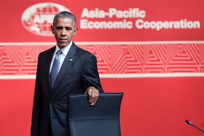 Obama, antes de tomar assento no fórum da APEC no Peru.