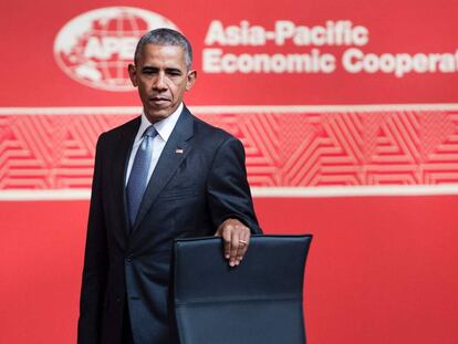 Obama, antes de tomar assento no fórum da APEC no Peru.