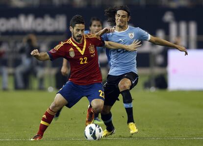 El debutante Isco con Edinson.