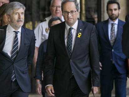 Grande-Marlaska (esq.) i Quim Torra, assisteixen a la Junta de Seguretat de Catalunya en el Palau de la Generalitat