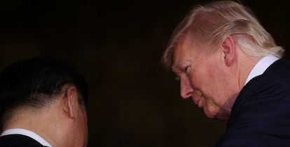 El presidente de EE UU, Donald Trump (dcha.) junto a su homólogo chino, Xi Jinping.