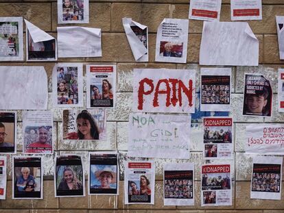 Posters with images of the hostages outside the Israeli army headquarters in Tel Aviv, on October 15.