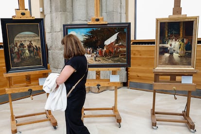 A person contemplate some paintings during the act at the Prado Museum.