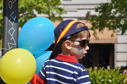 A child at Saturday’s event with the European flag painted on his cheek.