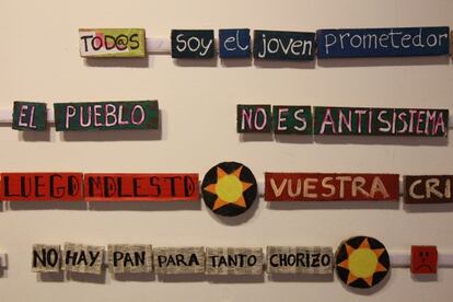 Lemas del movimiento de los indignados, en una exposición sobre el 15-M celebrada en el Ateneo de Madrid en 2012.