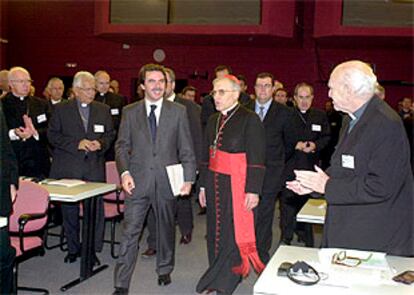 José María Aznar, junto al presidente de la Conferencia Episcopal, Antonio María Rouco, en un acto en El Escorial.