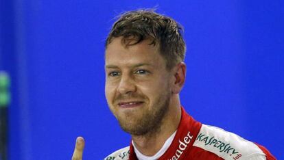 Vettel celebra su primera pole con Ferrari.