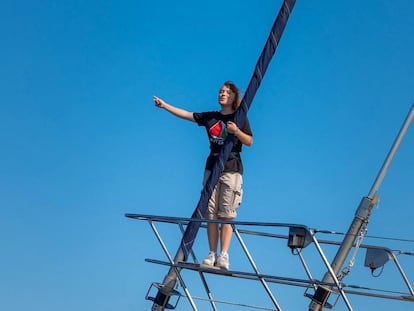 Activist Greta Thunberg stands aboard the aid ship Madleen.