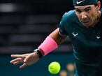 Spain's Rafael Nadal eyes the ball as he returns it to Australia's Jordan Thompson during their men's singles round of sixteen tennis match on day 4 at the ATP World Tour Masters 1000 - Paris Masters (Paris Bercy) - indoor tennis tournament at The AccorHotels Arena in Paris on November 5, 2020. (Photo by Anne-Christine POUJOULAT / AFP)