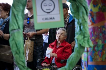 A woman lines up to vote in Valencia.