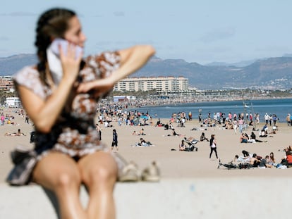 People at Malvarrosa beach in Valencia on March 14.