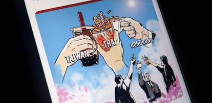Un móvil muestra un cartel de la "alianza del té con leche" entre los internautas de Taiwán, Tailandia y Hong Kong.