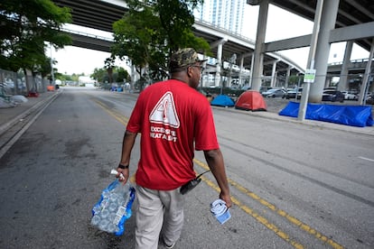 Bottles of water are delivered to homeless people in Miami-Dade County after the heat wave in the United States