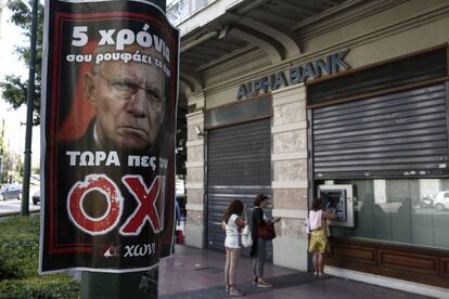 Fotografía de Wolfgang Schäuble en un cartel griego en contra de la austeridad.