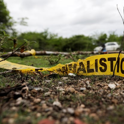 Yellow police tape is seen at the Barranca del Carnicero (Butcher's Ravine) where the remains of Christian Alfonso Rodriguez Telumbre, one of the 43 missing students from Ayotzinapa Rural Teachers' College, were found, at the mountain town of Cocula, near Iguala in the southwestern state of Guerrero, Mexico July 8, 2020. REUTERS/Henry Romero
