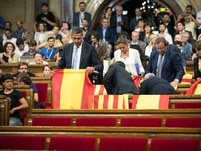 Spanish and Catalan flags inside the regional parliament on Wednesday.