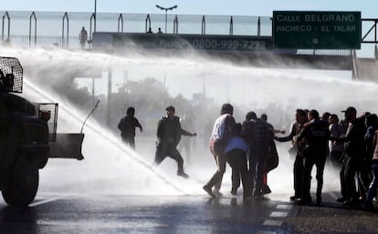 Demonstrators clash with police in Buenos Aires on Thursday.