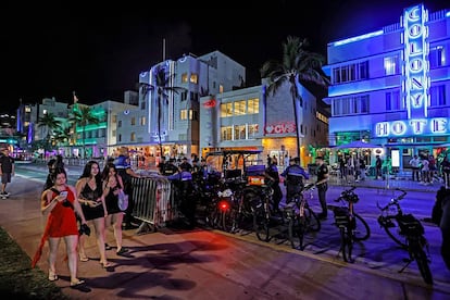 South Beach visitors walk along Ocean Drive during spring break in Miami Beach, Florida, on Saturday, March 9, 2024