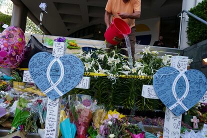 Memorial outside of the Old National Bank for the victims on April 14, 2023